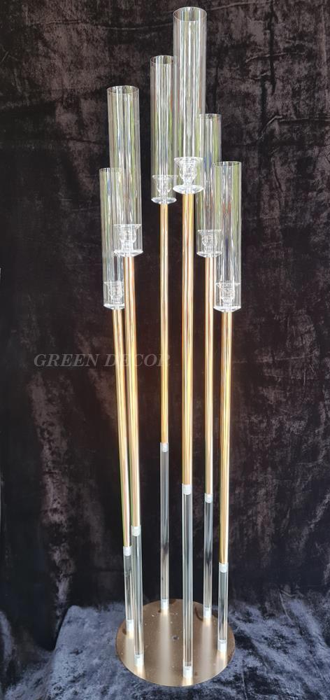 Decorative acrylic and metal candle holder with contemporary design element.